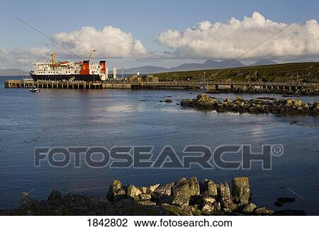 The Ferry Docked At Harbor; Scalasaig Harbor, Isle Of Colonsay, Island Of Colonsay, Scotland View Large Photo Image Stock Image - The Ferry Docked At Harbor; Scalasaig Harbor, Isle Of Colonsay, Island Of Colonsay, Scotland. Fotosearch
