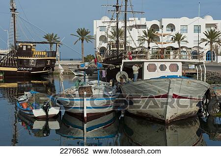 The fishing harbour at Houmt Souq; Djerba, Tunisia View Large Photo Image Stock Image - The fishing harbour at Houmt Souq; Djerba, Tunisia. Fotosearch