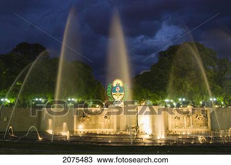 Stock Image - The Fountains At Night On Independence Square; Mendoza Argentina. Fotosearch