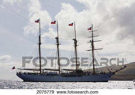 Stock Photo - The Four-Mast Barquentine, Chilean Navy Training Ship Esmeralda In Hanga Roa Harbour, Rapa Nui (Easter Island), Chile. Fotosearch