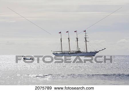 The Four-Mast Barquentine, Chilean Navy Training Ship Esmeralda In Hanga Roa Harbour, Rapa Nui (Easter Island), Chile View Large Photo Image Stock Photo - The Four-Mast Barquentine, Chilean Navy Training Ship Esmeralda In Hanga Roa Harbour, Rapa Nui (Easter Island), Chile. Fotosearch