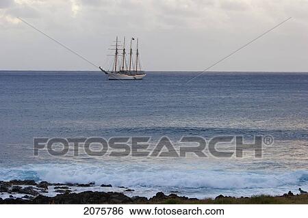 Stock Photograph - The Four-Mast Barquentine, Chilean Navy Training Ship Esmeralda In Hanga Roa Harbour, Rapa Nui (Easter Island), Chile. Fotosearch
