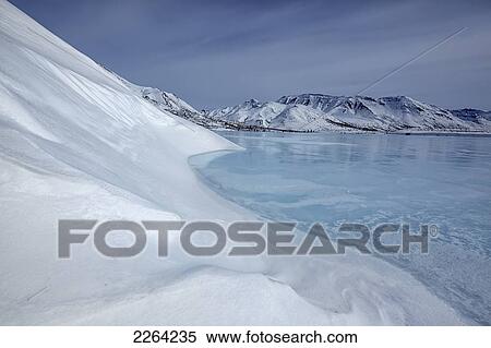 The frozen klondike river along the dempster highway in tombstone territorial park; yukon canada View Large Photo Image Stock Photography - The frozen klondike river along the dempster highway in tombstone territorial park; yukon canada. Fotosearch