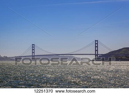 The Golden Gate Suspension Bridge in San Francisco Bay; San Francisco, California, United States of America View Large Photo Image Stock Image - The Golden Gate Suspension Bridge in San Francisco Bay; San Francisco, California, United States of America. Fotosearch