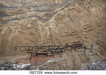 Stock Photo - The Hanging Monastery, Built On Stilts On The Side Of A Cliff Is A Buddhist Monastery, Northern Mountain, Heng Shan, Hunyuan, Shanxi, China. Fotosearch