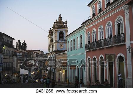 The historic colonial-era buildings of the Largo de Pelourinho square in the old upper city, on the right is the Slave Church of Nosso Senhor Do Rosario Dos Pretos built by former slaves; Salvador, Bahia, Brazil View Large Photo Image Stock Photo - The historic colonial-era buildings of the Largo de Pelourinho square in the old upper city, on the right is the Slave Church of Nosso Senhor Do Rosario Dos Pretos built by former slaves; Salvador, Bahia, Brazil. Fotosearch