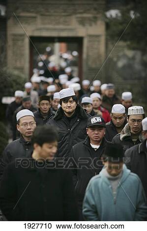 The Hui Community, Chinese Muslims, Arrive At A Mosque For Friday Prayers, Xian Great Mosque, Xian, Xi'an, Capital Of Shaanxi Province, China View Large Photo Image Stock Image - The Hui Community, Chinese Muslims, Arrive At A Mosque For Friday Prayers, Xian Great Mosque, Xian, Xi'an, Capital Of Shaanxi Province, China. Fotosearch