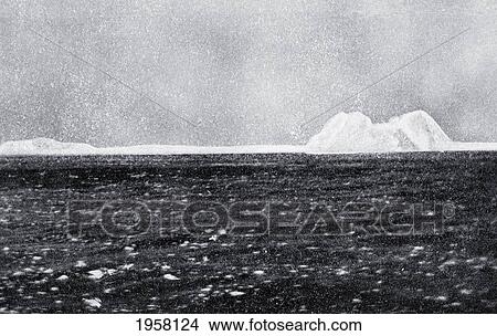 Picture - The Iceberg With Which Rms Titanic Of The White Star Line Collided And Caused Her To Sink. Photographed Near The Scene Of The Wreck By A Passenger On The Rescue Ship Carpathia. Source: Sinking Of The Titanic Edited By Thomas H. Russell, Published 1912.. Fotosearch