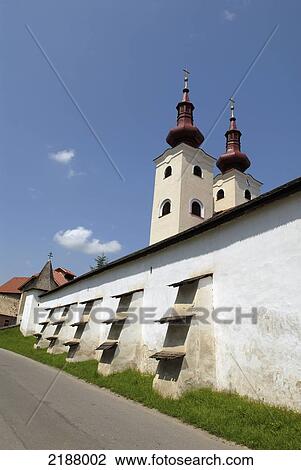 Stock Image - The Imposing Walls Of The 1000 Year Old Roman-Catholic Church Of Divin, Central Slovakia. Fotosearch