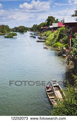 The island of Don Det on the Mekong River along the Cambodia/Laos border; Si Phan Don, Laos View Large Photo Image Stock Image - The island of Don Det on the Mekong River along the Cambodia/Laos border; Si Phan Don, Laos. Fotosearch