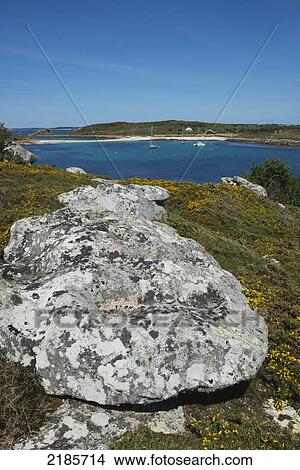 The Island Of Gugh Showing The Sand Bar (Tombolo) Viewed From St Agnes, Isles Of Scilly, Cornwall, Uk, Europe View Large Photo Image Picture - The Island Of Gugh Showing The Sand Bar (Tombolo) Viewed From St Agnes, Isles Of Scilly, Cornwall, Uk, Europe. Fotosearch