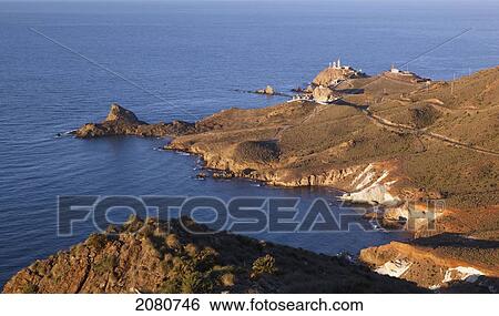The Lighthouse And Communications Apparatus On The Headland Cabo De Gata-Nijar Natural Park; Cabo De Gata Almeria Province Spain View Large Photo Image Stock Photograph - The Lighthouse And Communications Apparatus On The Headland Cabo De Gata-Nijar Natural Park; Cabo De Gata Almeria Province Spain. Fotosearch