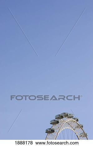 Stock Photo - The London Eye And Blue Sky, Close Up. Fotosearch