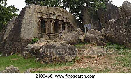 Stock Photo - The Main Hill At Mahabalipuram Is Dotted With Pillared Halls Carved Into The Rock Face, Tamil Nadu, India. Fotosearch