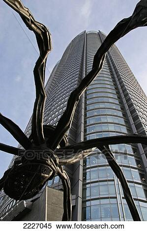 The Mori Tower And Maman Spider, Roppongi Hills, Tokyo, Japan - Copyright Mark Thomas/Axiom View Large Photo Image Stock Photography - The Mori Tower And Maman Spider, Roppongi Hills, Tokyo, Japan - Copyright Mark Thomas/Axiom. Fotosearch