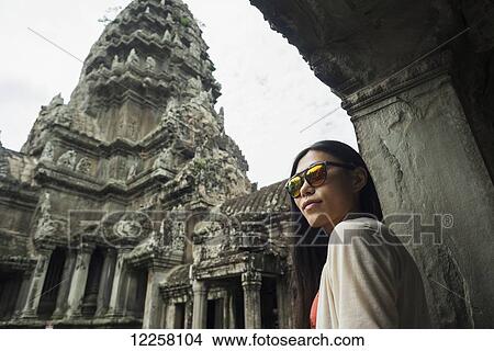 The most impressive temple of Angkor, built by the King Suryavarman II in the 12th Century dedicated to Vishnu; Siem Reap, Cambodia View Large Photo Image Picture - The most impressive temple of Angkor, built by the King Suryavarman II in the 12th Century dedicated to Vishnu; Siem Reap, Cambodia. Fotosearch