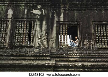 The most impressive temple of Angkor, built by the King Suryavarman II in the 12th Century dedicated to Vishnu; Siem Reap, Cambodia View Large Photo Image Stock Image - The most impressive temple of Angkor, built by the King Suryavarman II in the 12th Century dedicated to Vishnu; Siem Reap, Cambodia. Fotosearch