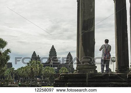 Stock Photo - The most impressive temple of Angkor, built by the King Suryavarman II in the 12th Century dedicated to Vishnu; Siem Reap, Cambodia. Fotosearch