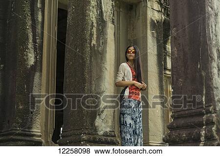 Stock Photo - The most impressive temple of Angkor, built by the King Suryavarman II in the 12th Century dedicated to Vishnu; Siem Reap, Cambodia. Fotosearch
