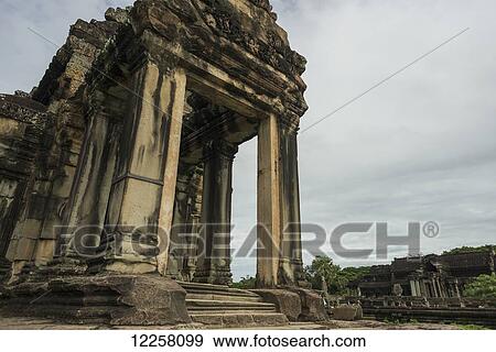 The most impressive temple of Angkor, built by the King Suryavarman II in the 12th Century dedicated to Vishnu; Siem Reap, Cambodia View Large Photo Image Stock Photo - The most impressive temple of Angkor, built by the King Suryavarman II in the 12th Century dedicated to Vishnu; Siem Reap, Cambodia. Fotosearch
