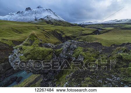The mountains and rivers of Icelands central highlands take on an otherwordly feel after the countries first snowfall; Iceland View Large Photo Image Picture - The mountains and rivers of Icelands central highlands take on an otherwordly feel after the countries first snowfall; Iceland. Fotosearch
