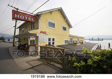 The Nimpkish Hotel In Aboriginal Village; Alert Bay, Cormorant Island, British Columbia, Canada View Large Photo Image Stock Photograph - The Nimpkish Hotel In Aboriginal Village; Alert Bay, Cormorant Island, British Columbia, Canada. Fotosearch