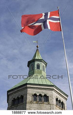 Stock Photo - The Norwegian Flag Flying Next To The Valberg Tower. Fotosearch