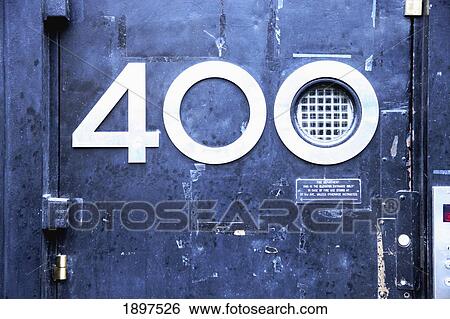Stock Photograph - The Number 400 On A Building's Door; New York City, New York, United States Of America. Fotosearch