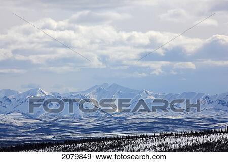 Stock Photo - The Ogilvie Mountains In The Distance In This Scene Taken From Eagle Plains, Yukon.. Fotosearch