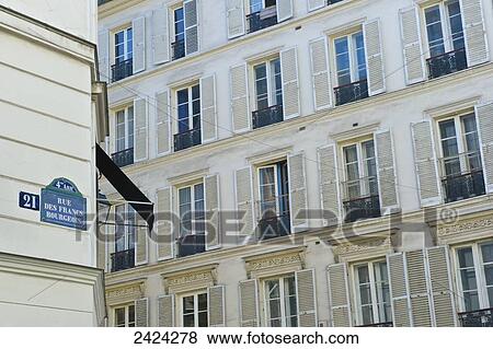 The ornate facade of a residential building, Marais district; Paris, Grance View Large Photo Image Stock Photo - The ornate facade of a residential building, Marais district; Paris, Grance. Fotosearch