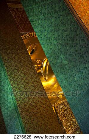 Stock Photo - The Reclining Buddha of Wat Pho; Bangkok, Thailand. Fotosearch