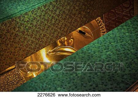Stock Photograph - The Reclining Buddha of Wat Pho; Bangkok, Thailand. Fotosearch