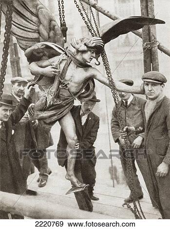 Stock Photo - The Removal Of The Statue Of Eros From Piccadilly Circus, London, England In 1925 During The Reconstruction Of The Underground Railway Station. From The Story Of 25 Eventful Years In Pictures, Published 1935.. Fotosearch