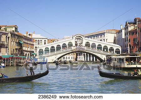 The Rialto Bridge on the Grand Canal; Venice, Veneto, Italy View Large Photo Image Stock Photo - The Rialto Bridge on the Grand Canal; Venice, Veneto, Italy. Fotosearch