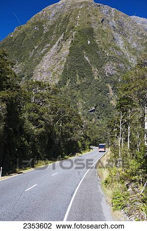 Stock Image - The Road Through The Mountainous Pass Into Milford Sound; New Zealand. Fotosearch