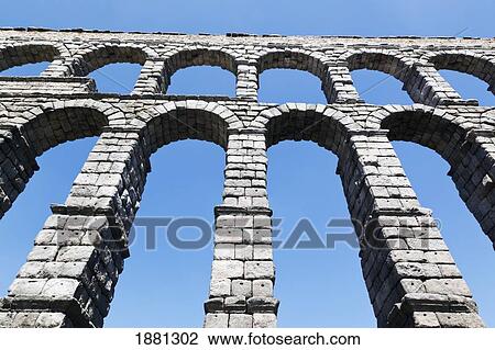 Stock Image - The Roman Aqueduct, A Unesco World Heritage Site; Segovia, Segovia Province, Spain. Fotosearch
