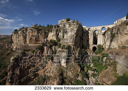 The Roman Bridge Of Ronda Along The Hike Trail; Ronda, Andalusia, Spain View Large Photo Image Stock Photo - The Roman Bridge Of Ronda Along The Hike Trail; Ronda, Andalusia, Spain. Fotosearch