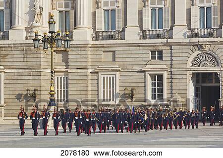 The Royal Palace With Foot Soldiers Of The Royal Guard In Traditional Uniforms; Madrid Spain View Large Photo Image Stock Image - The Royal Palace With Foot Soldiers Of The Royal Guard In Traditional Uniforms; Madrid Spain. Fotosearch