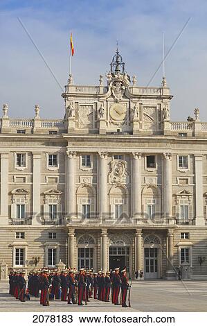 The Royal Palace With Foot Soldiers Of The Royal Guard In Traditional Uniforms; Madrid Spain View Large Photo Image Stock Image - The Royal Palace With Foot Soldiers Of The Royal Guard In Traditional Uniforms; Madrid Spain. Fotosearch