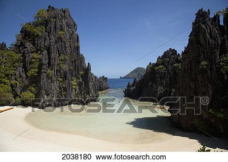 The Scenery Of Matinloc Island Near El Nido And Corong Corong; Bacuit Archipelago Palawan Philippines View Large Photo Image Stock Image - The Scenery Of Matinloc Island Near El Nido And Corong Corong; Bacuit Archipelago Palawan Philippines. Fotosearch