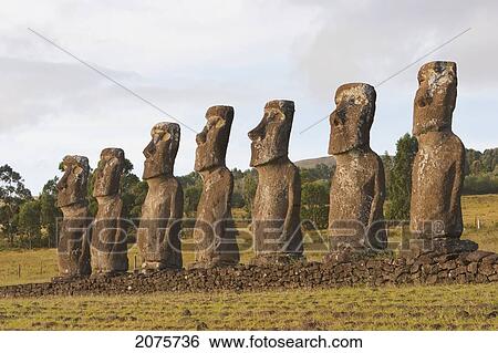 Stock Photograph - The Seven Moais (Restored In 1960 By Archaeologist William Mulloy) Of Ahu Akivi Are The Only Moai To Face The Ocean, Rapa Nui (Easter Island), Chile. Fotosearch