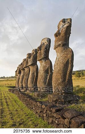 Stock Photography - The Seven Moais (Restored In 1960 By Archaeologist William Mulloy) Of Ahu Akivi Are The Only Moai To Face The Ocean, Rapa Nui (Easter Island), Chile. Fotosearch