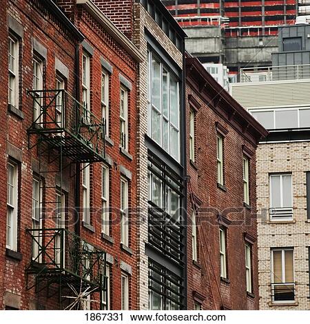 The Side Of A Brick Building With Fire Escapes View Large Photo Image Stock Image - The Side Of A Brick Building With Fire Escapes. Fotosearch