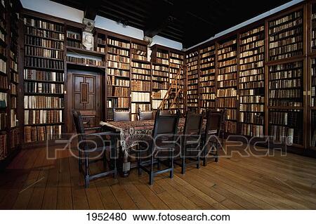 Stock Image - The small library in the Plantin-Moretus House-Workshops-Museum, Antwerp, Belgium. Fotosearch