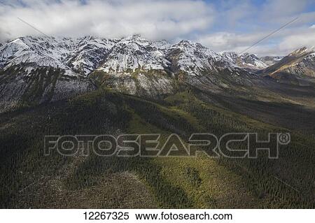 The snow-capped mountains of Kluane National Park and Reserve; Yukon, Canada View Large Photo Image Stock Photography - The snow-capped mountains of Kluane National Park and Reserve; Yukon, Canada. Fotosearch