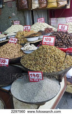 The spice market in Old Delhi. Old Delhi remains the chaotic heart of what is now a sprawling metropolis. Dilapidated and overcrowded its streets are a hive of activity. It was founded by the Mughal Emperor Shahjahan in 1639 and remained the Mughal cap View Large Photo Image Stock Image - The spice market in Old Delhi. Old Delhi remains the chaotic heart of what is now a sprawling metropolis. Dilapidated and overcrowded its streets are a hive of activity. It was founded by the Mughal Emperor Shahjahan in 1639 and remained the Mughal cap. Fotosearch