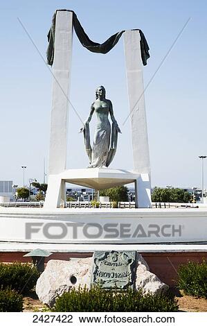 The statue of Rocio Jurado; Chipiona, Andalucia, Spain View Large Photo Image Stock Image - The statue of Rocio Jurado; Chipiona, Andalucia, Spain. Fotosearch