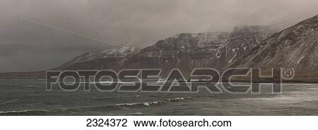 The Strandir coastline in a snowstorm located in the Westfjords; Iceland View Large Photo Image Stock Image - The Strandir coastline in a snowstorm located in the Westfjords; Iceland. Fotosearch