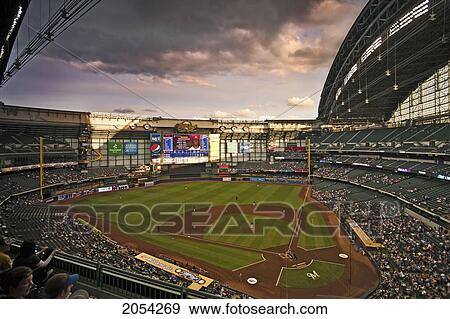The Sun Sets Before The Game Starts At Miller Park In Milwaukee Wisconsin Where The Milwaukee Brewers Play. View Large Photo Image Stock Photo - The Sun Sets Before The Game Starts At Miller Park In Milwaukee Wisconsin Where The Milwaukee Brewers Play.. Fotosearch