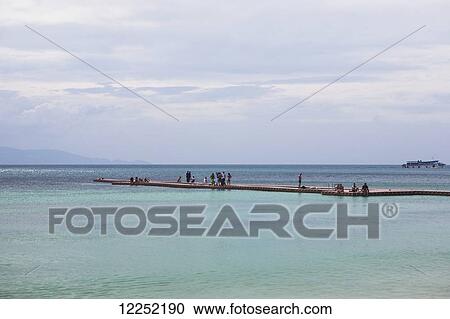 The sunset side of Had Rin beach is a much quieter and peaceful side of Ko Phangan's popular Full Moon beaches in Thailand; Ko Phangan, Thailand View Large Photo Image Stock Image - The sunset side of Had Rin beach is a much quieter and peaceful side of Ko Phangan's popular Full Moon beaches in Thailand; Ko Phangan, Thailand. Fotosearch